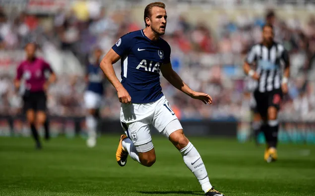 Tottenham Hotspur FC footballer Harry Kane in blue jersey
