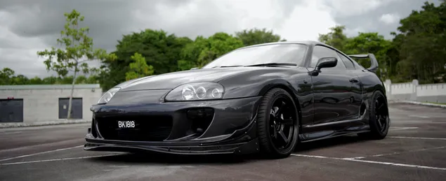 Toyota supra mk4 với màu đen và vành đen tải xuống