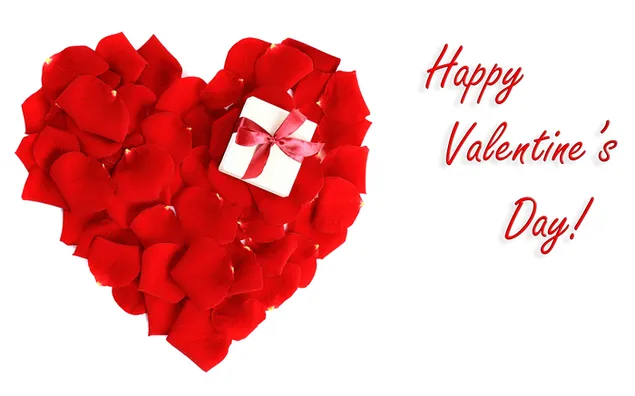 Día de San Valentín - caja de regalo en el corazón de pétalos de rosa