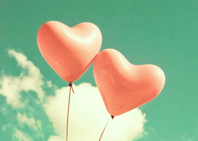 Día de San Valentín - globos de corazones en el cielo