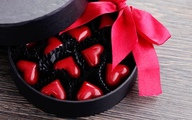 Valentine's day - red heart candies in cupcake liners 4K wallpaper