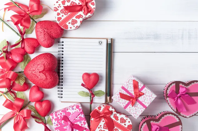 Día de San Valentín - corazones rojos y regalos.