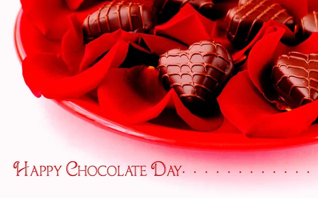 Día de San Valentín - pétalos de rosa y chocolates