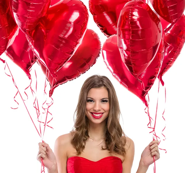 Día de San Valentín - niña sonriente con globos de corazón rojo