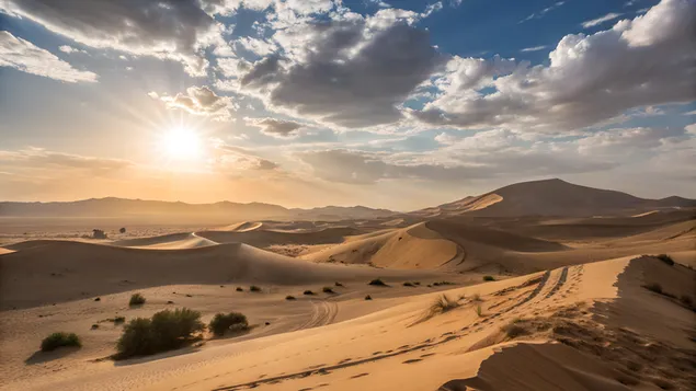 prostrani pejzaz pjescanih dina pod vedrim suncem i rasprsenim oblacima preuzmi