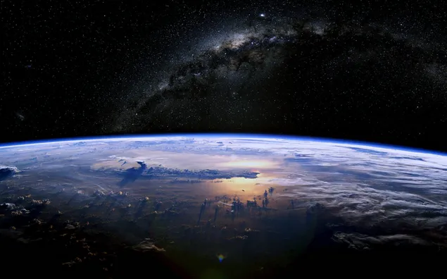 Weergave van sterren en de Melkweg 's nachts in de ruimte in close-up van de aarde download