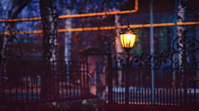 View of street lamp while snowing 4K wallpaper