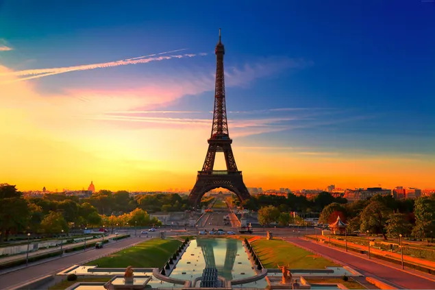 View of the Eiffel tower in France Paris in the middle of the city in red sky lights download