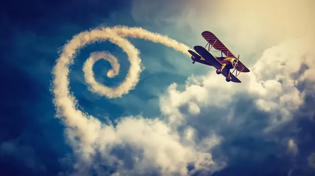 vintage-kaksitaso savuvanan kanssa pilvisella taivaalla lataa