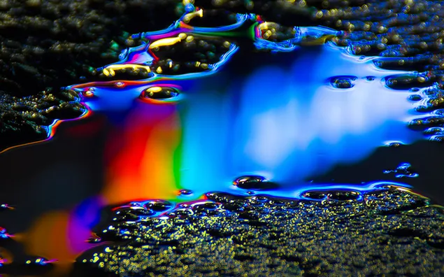 Water oil painting shapes in rainbow colors on black background