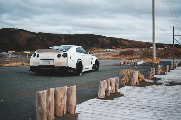 White sports car on road