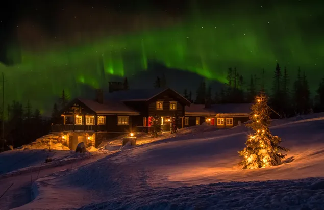 Winter house under the aurora borealis