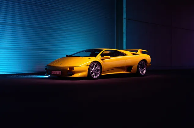 Vista lateral del Lamborghini amarillo 4K fondo de pantalla