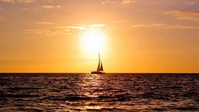 Zeilen bij zonsondergang download